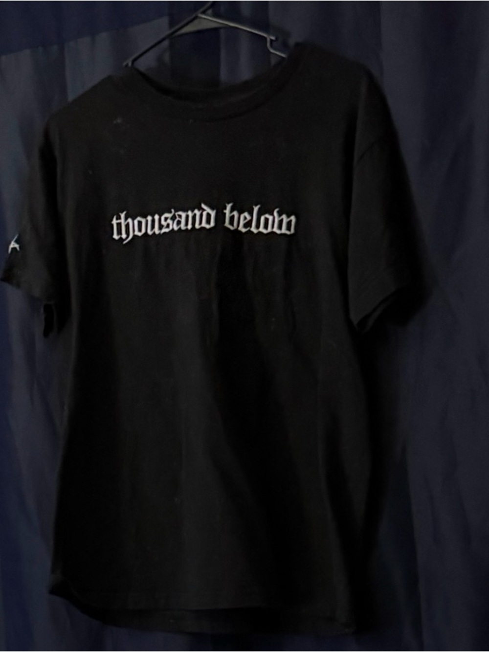 Thousand below band shirt